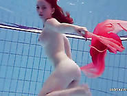 Wonderful Body Of The Redhead Looks Sexy Underwater