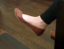 Shoe Dangling From Pretty Foot