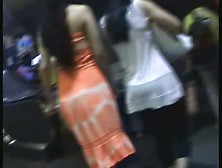 Amateur Upskirt Video Shows A Girl In A Seductive Orange Dress.