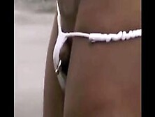 Asian Bodybuilder Barely Covered At The Beach