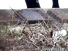 Four Japanese Schoolgirls Fool Around Outside Before Peeing