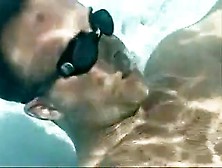 Couple Enjoys Oral Sex Under Water