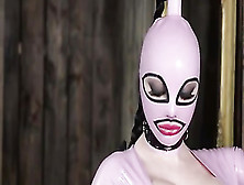 High Heeled Solo Milf In Latex Dress And Boots Poses Wearing A Mask
