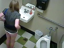 Blonde Peeing In Public Toilet