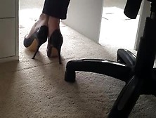 Passionate Secretary Playing With Her Sexy High Heel Shoes While Working At The Office