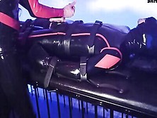 Tied Up Slave In Latex Gets A Handjob From A Kinky Master