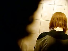 Skinny Redhead With Short Hair,  Shows Ass And Takes A Piss On A Toilet