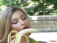 Hot Blonde Goes To Town On Banana In Public