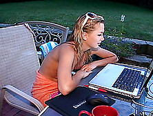 Blonde Slut Chatting On The Computer While Her Tits Are Out