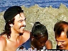 Sluty African Whore Fucked On A Beach In An Interracial Threesom