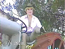 Cowgirl Wife On The Tractor Smiles As She Shows Her Cunt Upskirt