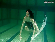 Dressed Up Teen Irina Barna Swims Sexy In The Pool