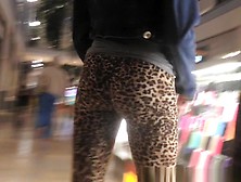 Teen In Leopard Leggings At The Shopping Mall