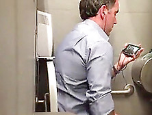 Stranger Man In A Public Toilet Filmed On A Hidden Camera