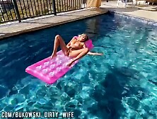 A Beautiful Blonde Masturbates In The Pool And Lures A Peeping Guy Into A Blowjob