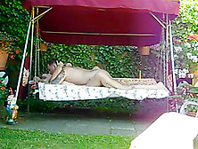 Mature Couple Has Sex On The Chair Swing In The Garden