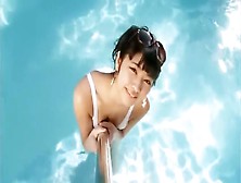 Sexy Asian Girl Wearing Heels In The Pool.