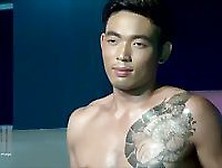 Tattooed Asian Guy Tugging Dick