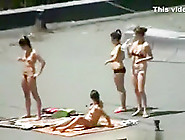 Voyeur Tapes 4 Girls Tanning With Their Boobs Naked On A Roof With His Cellphone