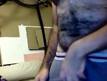 Hairy Bearded Man Stroking His Cock