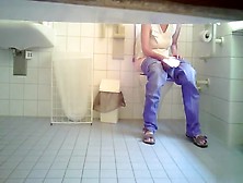 Cutie In Jeans Makes Water In The Ladies Room