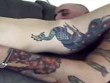 Tattooed Couple Fucking On Couch